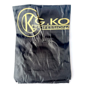 پیشبند ضدآب مشکی آرایشگاهی با قلاب قابل تنظیم، مناسب رنگ مو و اصلاح حرفه‌ای