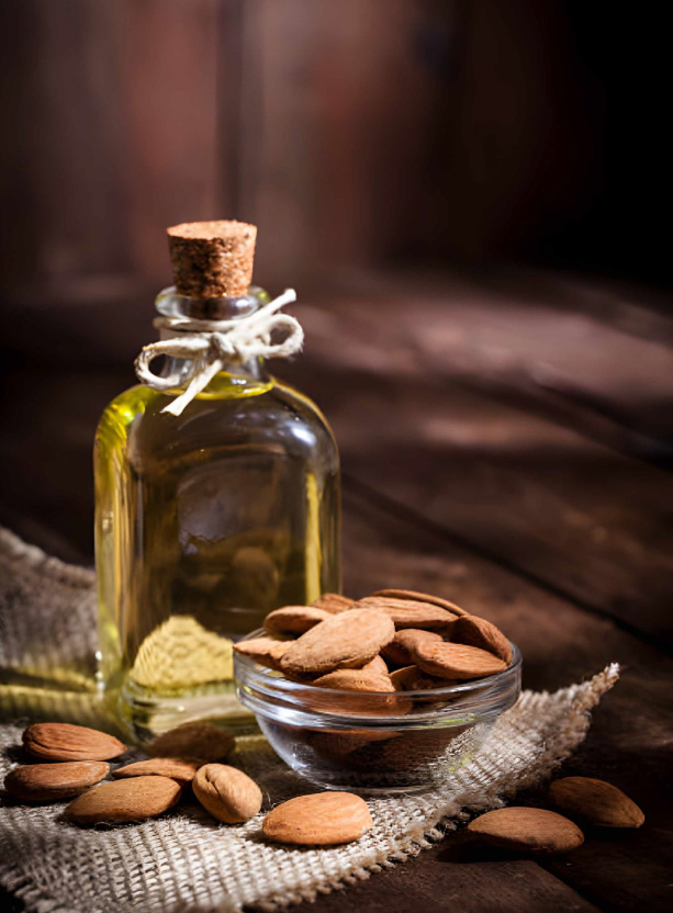 قطره روغن بادام شیرین روی موهای خشک برای نرمی و براق شدن